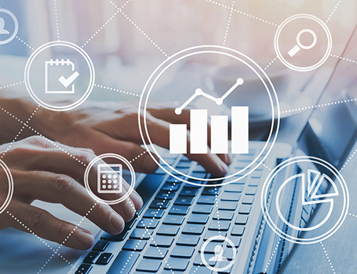 Consultants collaborating on cloud architecture diagrams